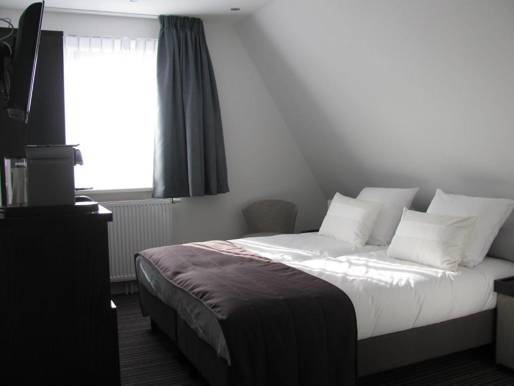 Boutique Hotel De Zwaluw De Koog  Szoba fotó